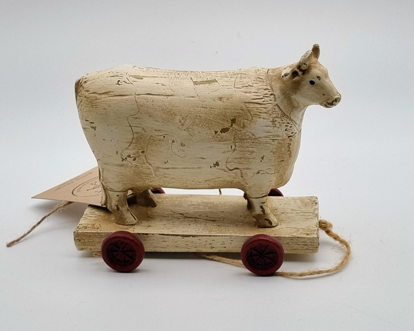 Houten koe (tje) op kar