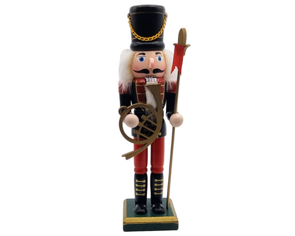 Kerstbeeld van man met hoorn.