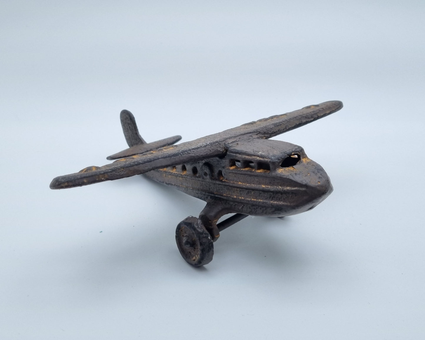 Cast iron statue of airplane